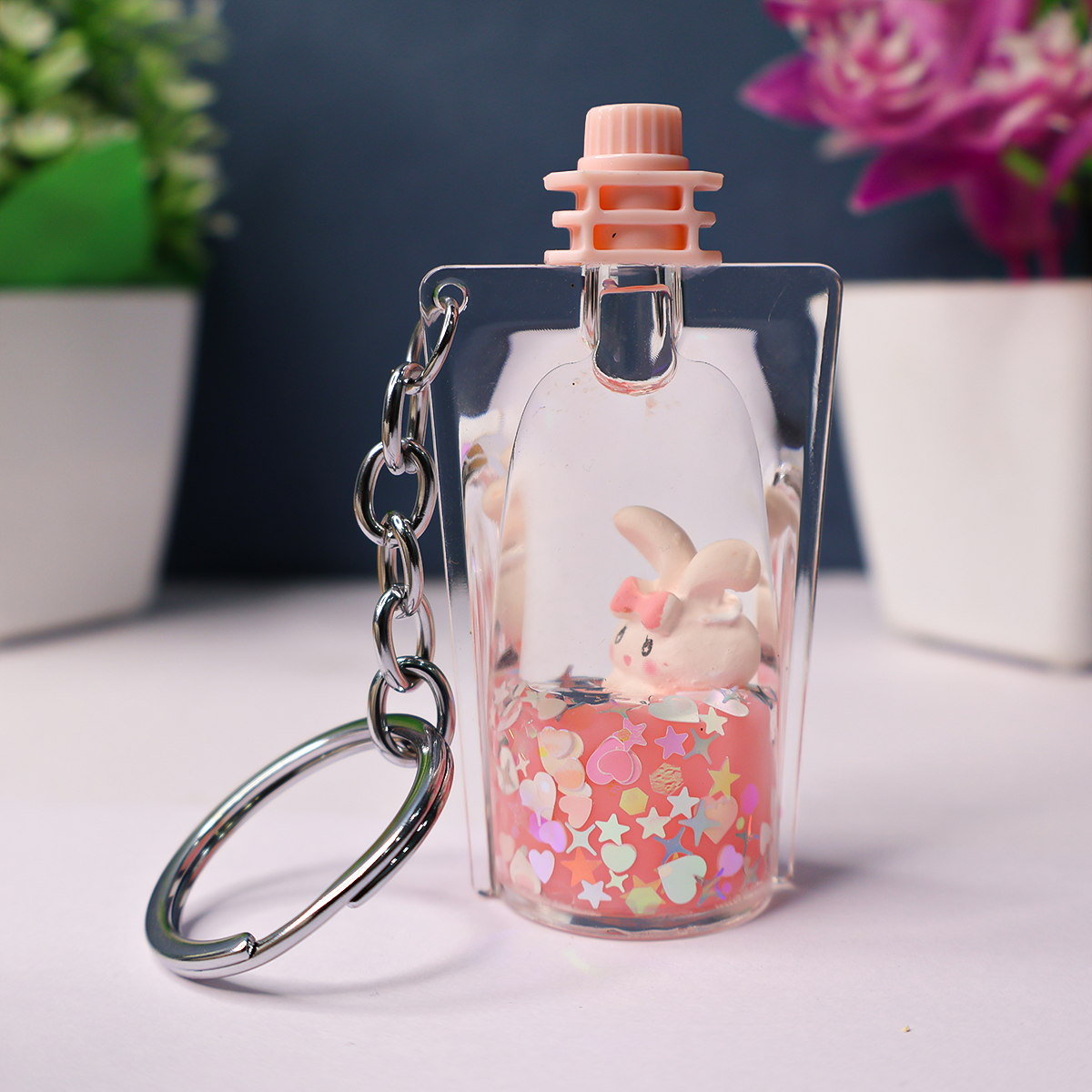 Floating bunny keychain peach color